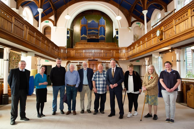 West of England Combined Authority Mayor Dan Norris visits sites in the area. Meeting Radstock people who hope to make Trinity Methodist Church a community centre. March 2022.