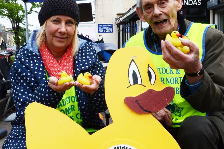 Outgoing President Sarah Oughton and incoming President Alan Denham with ducks for sale.The change of President takes place later this month.