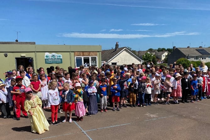 Shoscombe School children took part in a costume parade for the Queen. 