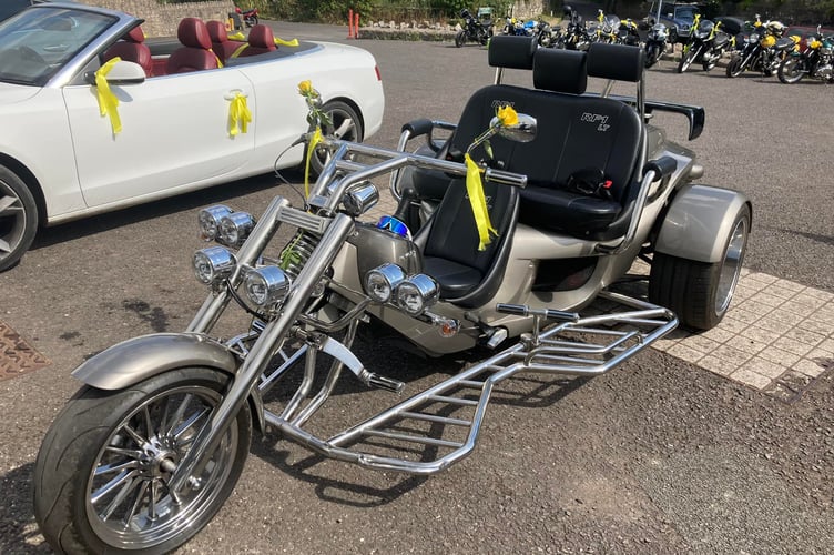 A yellow bow trike