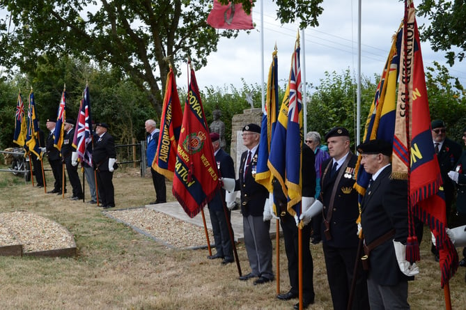 Standards on Parade in front of the Memorial in Paulton. 