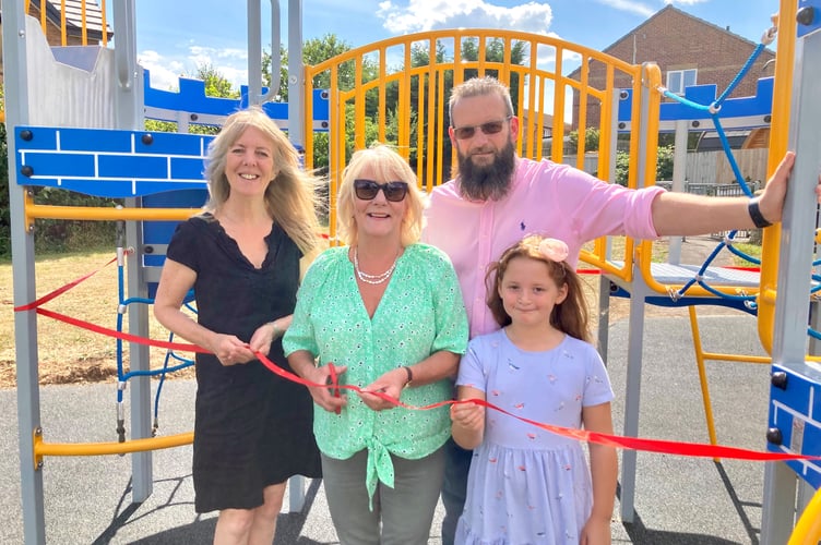 Councillor Sarah Bevan and Councillor Karen Walker (centre) with Gavin Heathcote and his daughter, Hope.