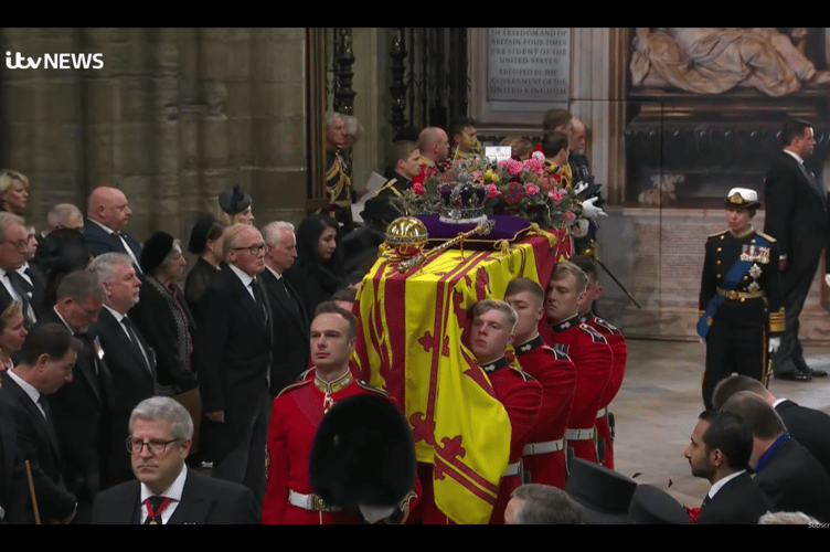 Thousands gather to watch as Queen Elizabeth’s funeral takes place in Westminster Abbey. 