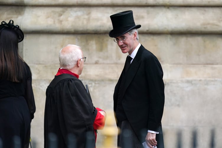 Business Secretary Jacob Rees-Mogg arrives for the State Funeral of Queen Elizabeth II, held at Westminster Abbey, London. Picture date: Monday September 19, 2022.