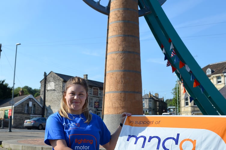 Millie Hawkins stood outside Radstock Wheel. 