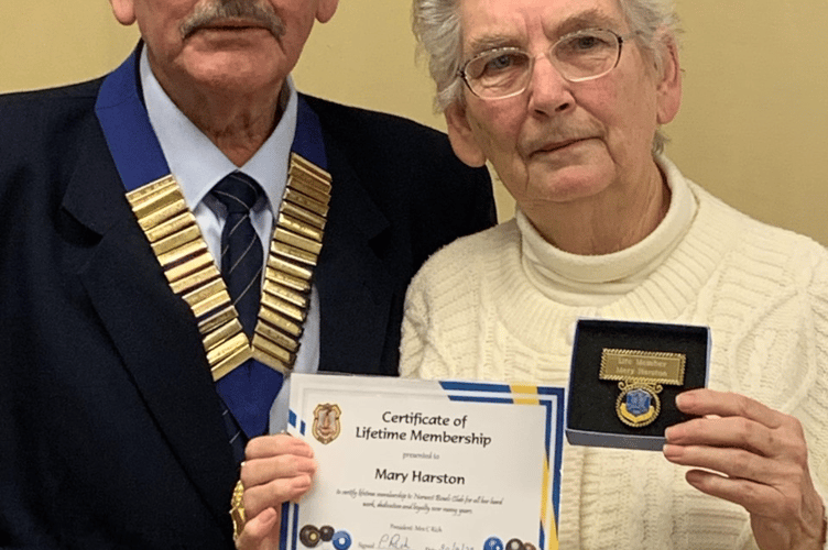 Norwest President, Merv Ashman, presenting Mary Harston with her Life Membership award.
