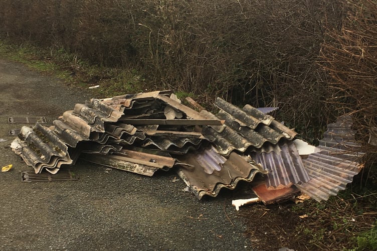 Asbestos sheets have been left in Radstock. 