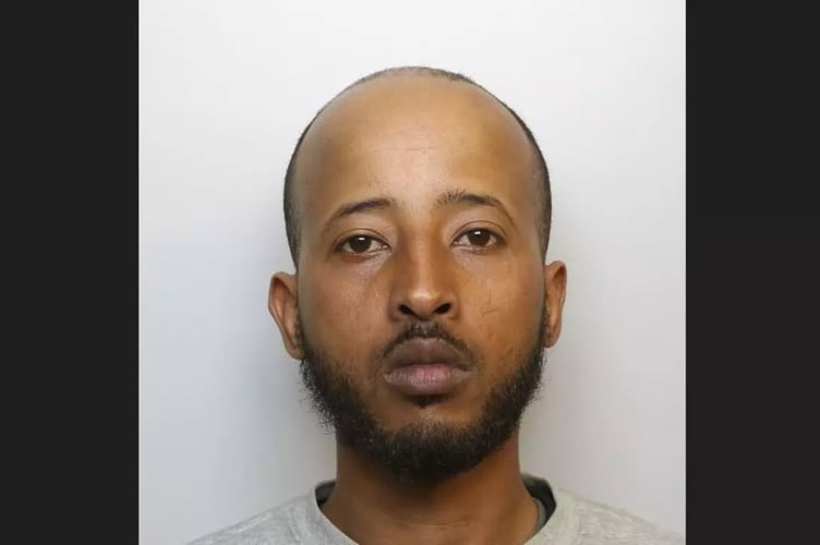 Guled Aidid, 39 of no fixed address, remains wanted by police after failing to attend his trial at Bristol Crown Court.