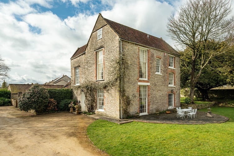 The former family home of Jacob Rees-Mogg in the village of Hinton Blewett, for sale at Â£2.75 million. See SWNS story SWLNhouse. Jacob Rees-Moggâs former family home is up for sale with a Â£2.75 million price tag. The Rees-Mogg family moved in to the idyllic country spread in Somerset in 1978, giving the future Tory MP and cabinet minister a lavish home to grow up in.  The eight-bedroom property in the picture postcard village of Hinton Blewett, has also more recently been home to  om Alexander, the CEO of Orange and T-mobile and the founder of Virgin Mobile. He lived at the Grade II Listed property for 20 years, even renting it out for a year to Irish pop band The Corrs.