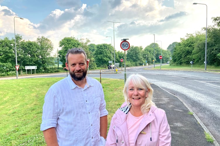 Cllr Gavin Heathcote (left) and Cllr Karen Walker (right) at A367/Bath Road junction where a new roundabout is to be built.