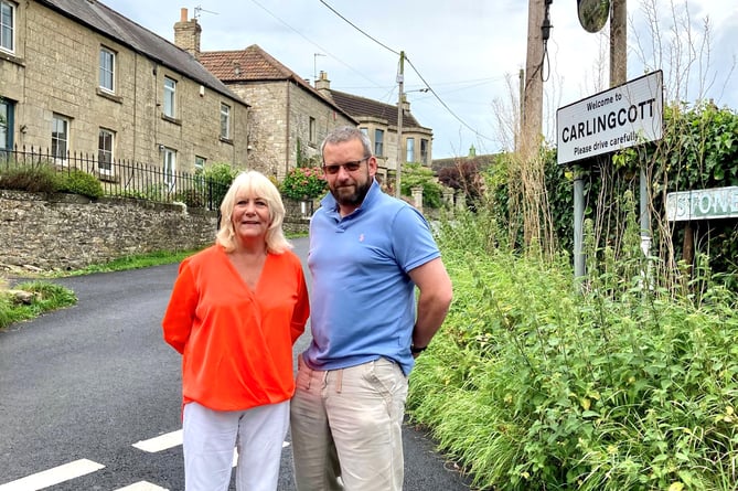 Cllrs Karen Walker and Gavin Heathcote in Carlingcott.