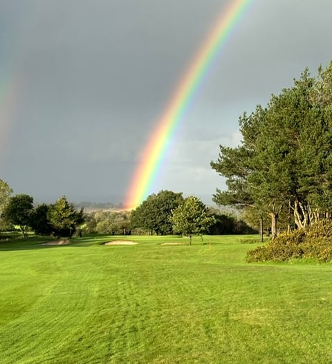 Rainbow lights up Mendip Golf Course on unrelenting day of rain