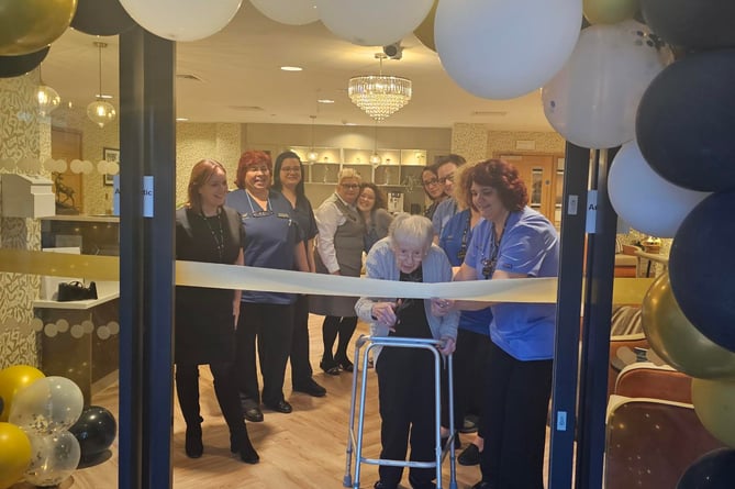Photograph: Rowan Park resident, Mavis, opened the doors to the new care home.