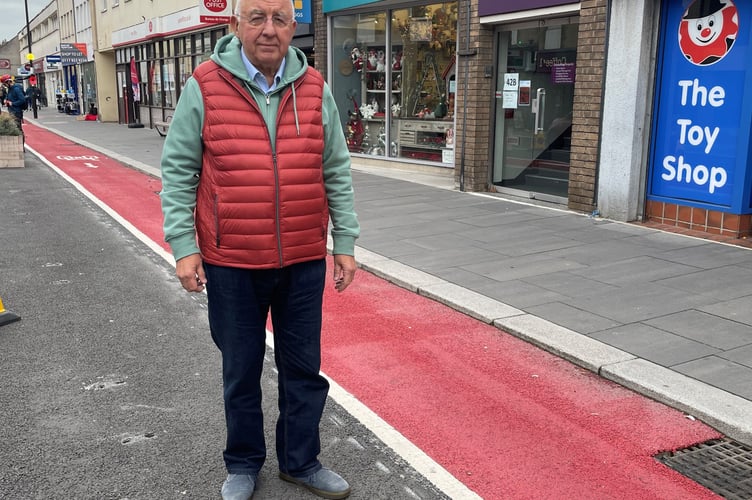 Keynsham South councillor Alan Hale by the cycle lane on Keynsham High Street (Image: Alan Hale)