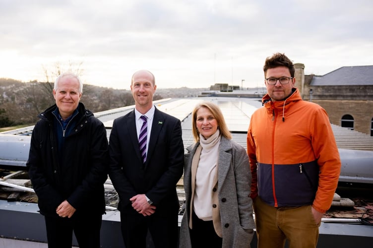  Nick Bird, Community Engagement Manager BWCE; Tim Markall, Headteacher Beechen Cliff School; Wera Hobhouse MP and John Rawlins, Renewable Energy Project Developer BWCE at Beechen Cliff School rooftop solar system. 