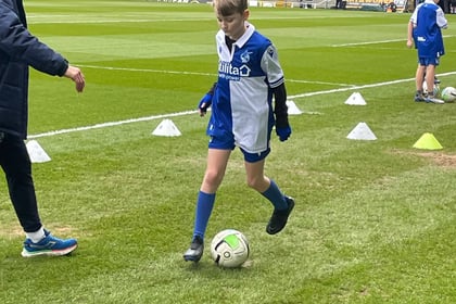 Stratton Utd U11s player honours great granddad at Bristol Rovers game