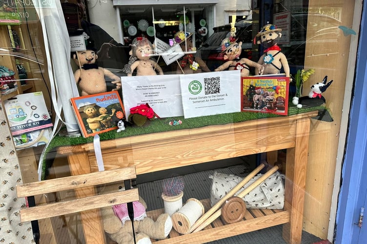 The now covered naked knitted dolls at The Hive café and haberdashery in Shepton Mallet, Somerset (Mike Alford/SWNS)