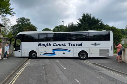 Coach's half-hour 'three point turn' prompts call for clear signage