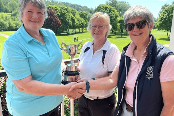 Tina Davies and Katrina Foote are presented with the gross trophy