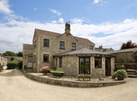 Period cottage with 'cider press' living room on the market for £800K