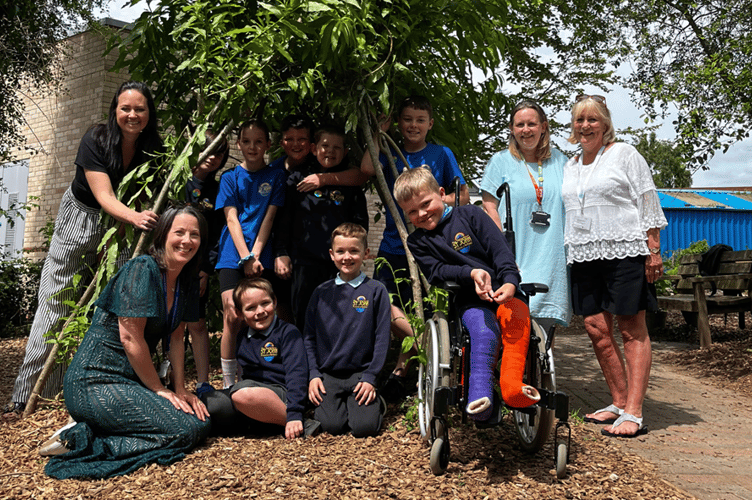 Students at Peasedown St John School showcase their new conservation area funded by a £2,000 donation