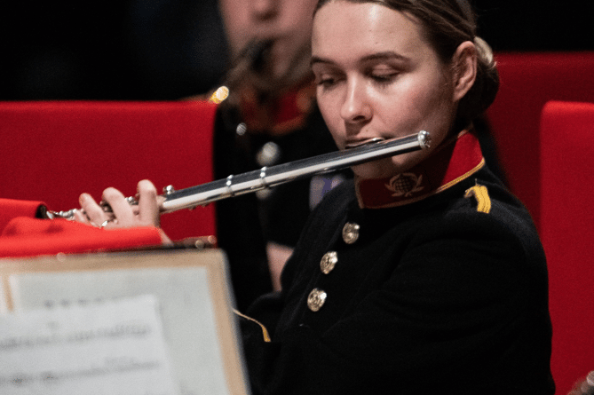 Royal Marines Band performing at the hospice for their fellow bandmate