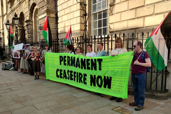 Green councillors Joanna Wright, Saskia Heijltjes, and Sam Ross (fifth from right to third from right) with campaigners outside the council meeting on July 18