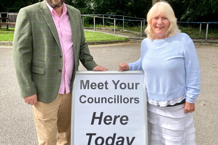 Cllr Gavin Heathcote (left) and Cllr Karen Walker (right) outside the Peasedown Community Library.