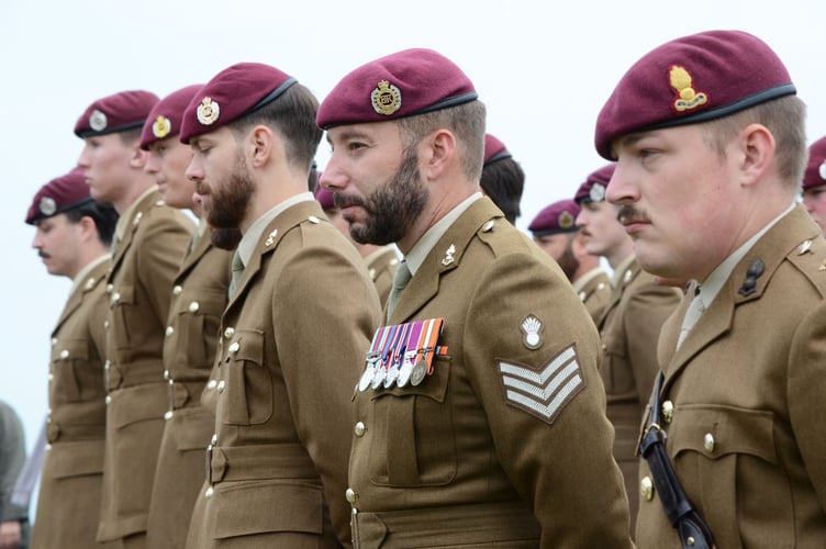 Members of the 9th Parachute Squadron Royal Engineers march to the service