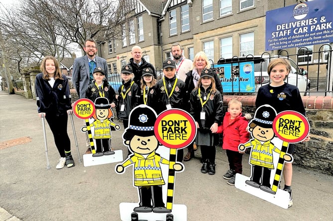 Cllr Gavin Heathcote has been a consistent campaigner for more investment in Peasedown’s mini-police. He is pictured with Cllr Karen Walker and Peasedown St John Primary School staff and pupils in 2023, shortly after the Peasedown Community Trust invested funding in the new village’s new ‘parking buddies.’