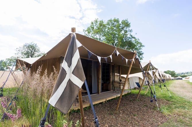 A glamping site is providing posh accommodation for fussier Glastonbury Festival goers. The Pop-Up Hotel, a luxury glamping company, has set up shop near Worthy Farm. Described as an "unforgettable experience", customers can choose from several different yurts, suites, huts and railway carriages to relax in after a long day at the festival. Glastonbury, Somerset. June 25 2024.