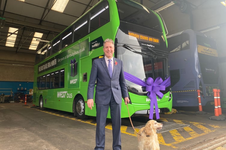 Dan Norris with his dog at the extension of the birthday bus fare scheme