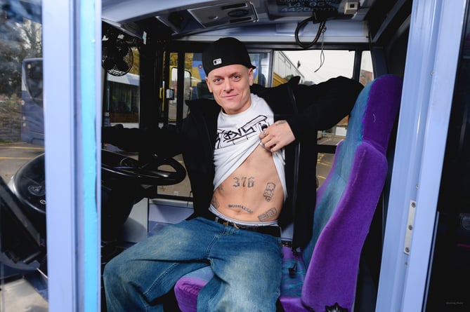 DJ Charlie 'CHAS23' Alecsander with his 376 tattoo. 