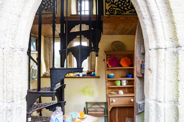 Ruthâs Cottage.Release date November 25 2024. A couple who bought a cottage for Â£1K have turned it into the ultimate playground for their grandkids - including three life-size playhouses. Alban, 86, and Angela Bunting, 82, moved from Hertfordshire to Binegar in Somerset in 1964 - after buying the 17th Century derelict property for Â£1,250.  The pair moved their lives from Hertfordshire to the small village and Alban skillfully renovated the falling down home - now called Spindle Cottage. But when Alban was told him and his wife were going to be grandparents he decided to design and build three playhouses for their much-loved grandchildren.  The first creation was a cottage in Gothic style built for Ruth in 2002 - with a spiral black staircase inside.