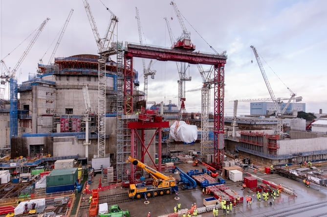 Workers building the Â£26bn Hinkley Point C nuclear power station have installed Britainâs first new nuclear reactor for more than 30 years. The first of two 13m long âreactor pressure vesselsâ will produce enough energy alone to generate reliable low carbon electricity for 3m homes. With two units, the power station will provide Britain with 7% of its electricity. This major milestone comes less than 12 months after the huge steel dome was lifted in place to close the reactor building at the Somerset facility. The reactor is the first to be installed at a British power station since Sizewell Bâs in 1991. Energy Secretary Ed Miliband said: âInstalling the first reactor pressure vessel at Hinkley Point C is a significant feat of engineering and a major step forward for the UKâs most advanced nuclear project.
