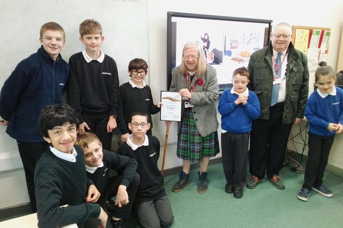 Fosse Way School receive the WIRE Award from Dr Eleanor Jackson and Cllr Phil Wilkinson.