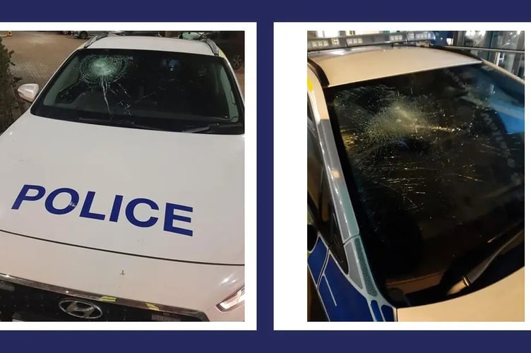 Damaged police cars